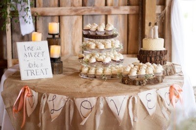 Dessert table set up inside the covered barn at Highland Oaks in Palmyra, Indiana